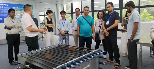 圖5  國際山地組織代表團訪華交流，共探全釩液流電池。（華瀘集團供圖）.jpg